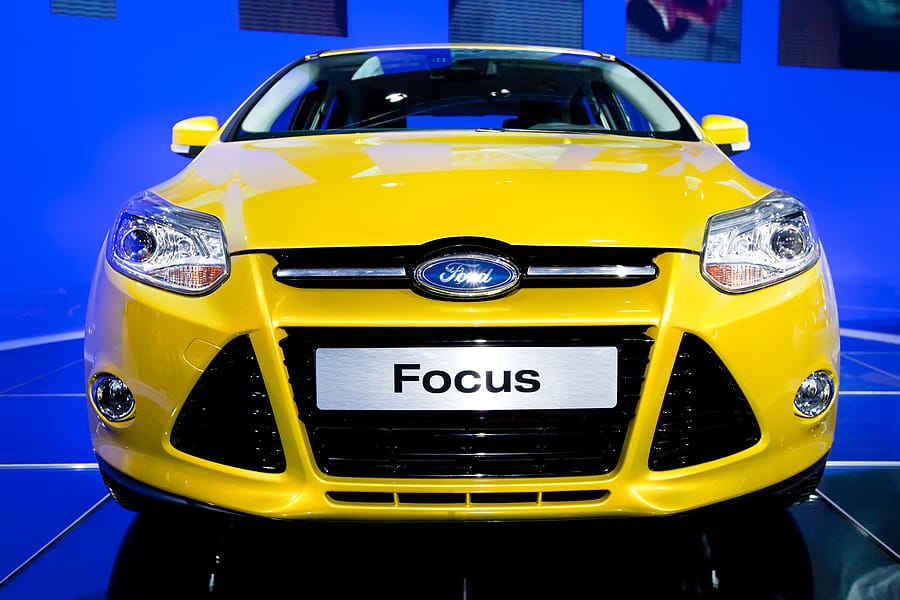Yellow car Ford Focus at Moscow International exhibition InterAuto