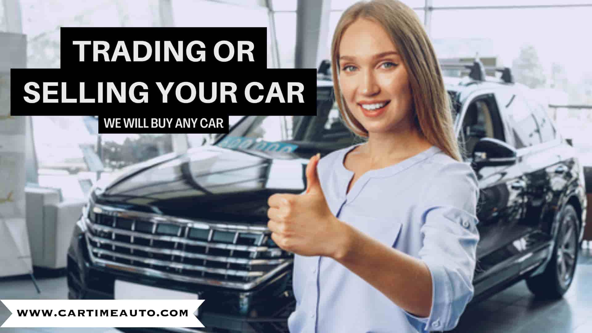 Woman showing thumbs up in a car dealership